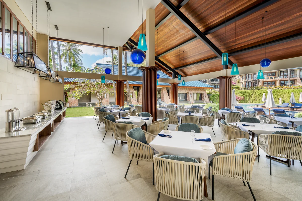 Sunrise Restaurant overlooking the resort pool and gardens at Sundancer